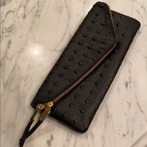 Henri Bendel black leather studded clutch bag